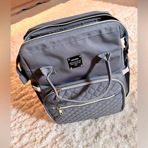Lequeen diaper bag backpack/changing station